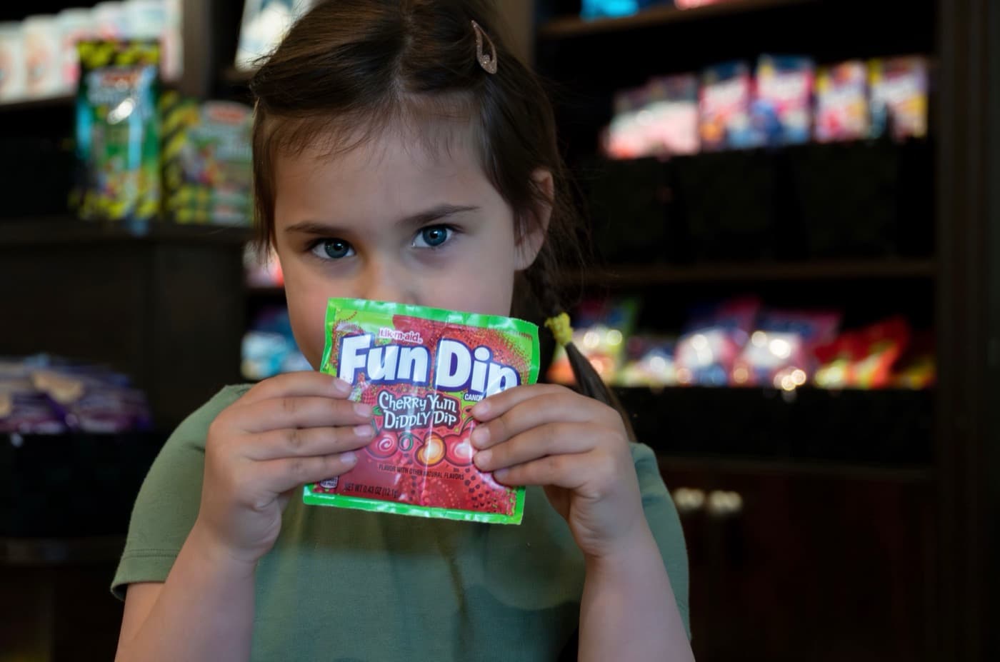 A girl enjoying a Fun Dip