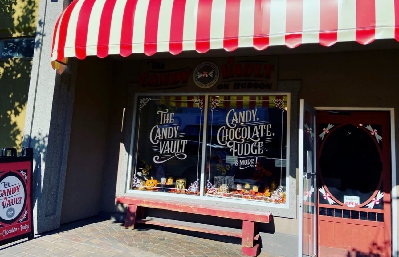 The red and white striped awning outside The Candy Vault at 171 Hudson Avenue NE, Salmon Arm